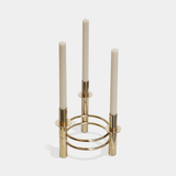 Castro Lighting Novel Candle Holder in polished brass, available from Touched Interiors UK