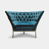 Coleccion Alexandra Flute Armchair in deep-buttoned Lisboa Agua Marina fabric on a platinum iron base