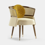 Mezzo Collection Frida II Dining Chair, Alhambra Jimena 17 and 15 fabric, matte walnut frame, rattan, polished brass, available from Touched Interiors UK