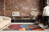 Serge Lesage Mae Browned Rug in plum, brown and blue, room view