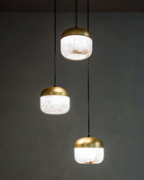 United Alabaster Copper Cluster Pendant Light in three natural alabaster shades with satin gold brass caps