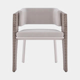 Luxxu Galea Wood Dining Chair in a white powder coated frame, Valencia Sand outdoor fabric and seashell weave