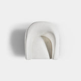 Plush cream velvet Amirah accent chair with brass accents, combining modern elegance and comfort.