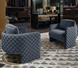 Pair of Anello diamond quilted armchairs in a living room