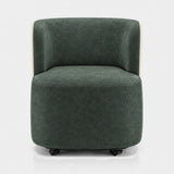Aperitivo Castor Base Luxury Dining Chair, shown in emerald and ivory nubuck