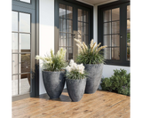 Ardesia Textured Stone Luxury Planter in anthracite, planted in an interior