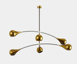 Illuminate Your Dining Room with the Arlo Mid-Century Modern Ceiling Lamp. Elevate your dining experience with the Arlo ceiling lamp by Mezzo Collection. This exquisite luminaire features a playful, asymmetrical design in black metal and gold-plated brass, casting a warm and inviting glow over your dining table.