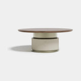 Ashford Round Leather Base Luxury Dining Table: matt walnut top on a channelled ivory genuine leather base (Cat B) with a metal ring