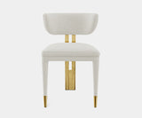 Luxxu Talie Dining Chair in polished brass and Monet Pearl fabric