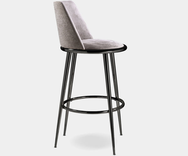 Elevate your interior with our Aurora Imbottita Stool, meticulously crafted in Italy. This luxurious upholstered stool exudes sophistication and style, perfect for adding a touch of luxury to your kitchen or bar area.