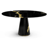 A Story Told in Every Crack: The Boca do Lobo Lapiaz Black Dining Table - Experience the captivating design of the Lapiaz Black Dining Table by Boca do Lobo. Featuring a cracked mahogany surface accented with gold brass, this table is a conversation starter with a unique story to tell.