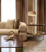 Boca do Lobo Metamorphosis Center Table in Emperador marble in a living room