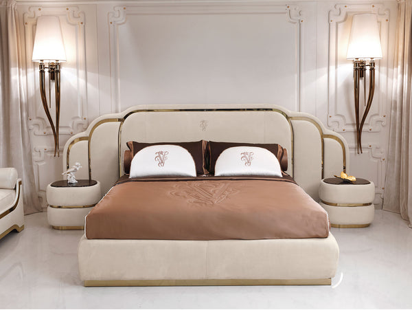 The Bradley Bed by Giuseppe Viganò: Italian design excellence reimagined for the modern bedroom. This king-size bed boasts a quilted upholstered headboard and a sleek stainless steel frame.