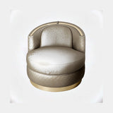 Castro Lighting Carlo Armchair in quilted fabric upholstery with a gold-plated brass base, available from Touched Interiors UK