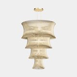 Castro Lighting Flusso Chandelier in gold-plated brass, available from Touched Interiors UK