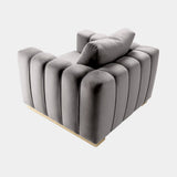Castro Lighting Colombo Maple Armchair in fabric upholstery with a gold-plated brass plinth, available from Touched Interiors UK