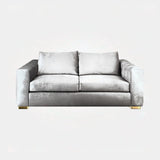 Castro Lighting Colombo Two Seater Sofa in fabric upholstery with a gold-plated brass plinth, available from Touched Interiors UK