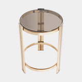 Castro Lighting Marie Side Table in polished brass with a marble top, available from Touched Interiors UK