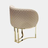 Castro Lighting Susan Dining Chair in fabric upholstery with a gold-plated brass base, available from Touched Interiors UK