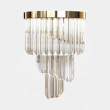 Castro Lighting Royal Wall Light in gold-plated brass with clear glass, available from Touched Interiors UK