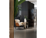 Celine Luxury Designer Armchair and Modern Curved Pouf styled in a luxury interior