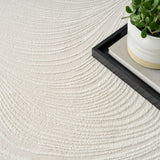 Central Park West Swirl Ivory Luxury Rug, available from Touched Interiors UK