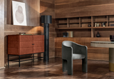 Curvo marble table in a wood panelled study