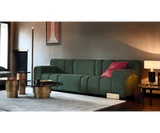 Ruolo round walnut side tables styled in a bedroom
