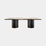 Daytona Tobia Dining Table, shown in matt black open pore ash with satin brass