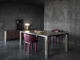 Dorsoduro Cylinder Leg Marble Luxury Dining Table in a room setting
