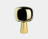 Elegant Dusk Dawn Table Lamp featuring a metallic glass shade and geometric brass base for high-end decor.