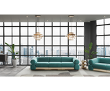 The Fitzgerald Sofa: A fusion of comfort and style. The rounded design and brass details create a luxurious and inviting statement piece.