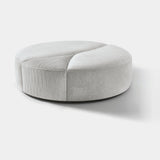 Giorgio Collection Mirage Round Ottoman in light grey velvet with a satin black nickel base