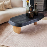 Glam Rug in Cannelle under a dark wood coffee table