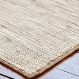 Glam Rug in Perle, detail of the hand-woven pile and edge