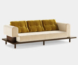 Grant: Modern Asymmetrical Sofa in Fabric & Matte Wood Frame. The Grant sofa by Mezzo Collection embodies modern elegance. This captivating design features a unique asymmetrical silhouette, plush fabric upholstery in a range of colors, and a beautiful matte wood frame, creating a statement piece for any modern living space.