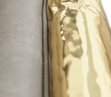 Boca do Lobo Imperfectio Sofa, close-up of the brass against the upholstery
