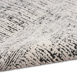 Irradiant Cream Black Luxury Rug, available from Touched Interiors UK