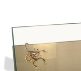 Boca do Lobo Metamorphosis Center Table, close-up of the brass creatures under glass