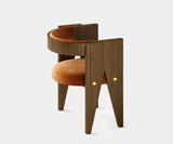 Luxury Dining Chair with Modern Comfort: Elevate your dining experience with the Presidio Mid-Century Chair by Touched Interiors. This robust walnut wood chair features a captivating mid-century design, plush upholstery for comfort, and polished brass detailing for a touch of glamour.