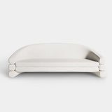 Luxury Hutton Sofa upholstered in cream velvet with brushed brass accents, perfect for modern high-end interiors.