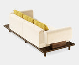 Grant Sofa: Spacious Seating for Modern Living. Unwind in ultimate comfort with the Grant sofa by Mezzo Collection. This modern asymmetrical design offers ample seating space, perfect for entertaining guests or sprawling out for a relaxing movie night. The plush fabric upholstery and matte wood frame create a luxurious and inviting atmosphere in your living room.