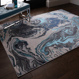 Ocean Metallic Blue Luxury Rug, shown in a room setting