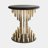 Castro Lighting Projection Stool in gold-plated brass with a black top, available from Touched Interiors UK