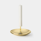Puntina Push Pin Luxury Candle Holder in brass with a white candle