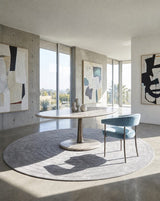 Rastrema Oval Pedestal Luxury Dining Table in a room setting