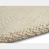 Riverstone Ivory Wool Luxury Rug, available from Touched Interiors UK
