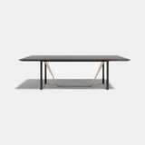 Rocco Metal Base Luxury Dining Table: matt dark wood veneer top with a metal base