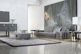 Giorgio Collection Charisma Round Ottoman in grey velvet with a light gold chrome base, room setting 2