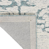 Sculptural Teal Wool Luxury Rug, available from Touched Interiors UK